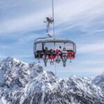 Groß (mit_dem_sessellift_rauf_auf_die_piste_dolomitenregion_kronplatz)
